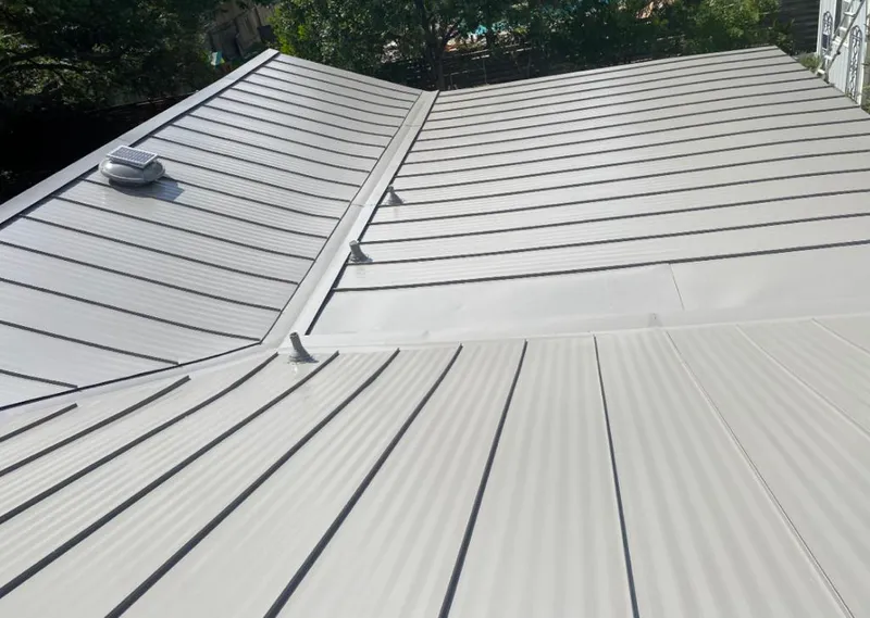 Solar attic fan installed on a metal roof for Roof Ventilation in SeaTac